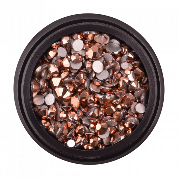 Strasszkő 33 rose gold Strasszkő 33 rose gold:Műkörömbe építhető vagy a felületére ragasztható strasszkövek....